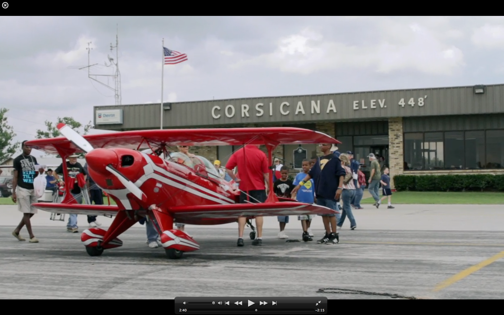 Spectators Looking at Biplane at CAF Air Show
